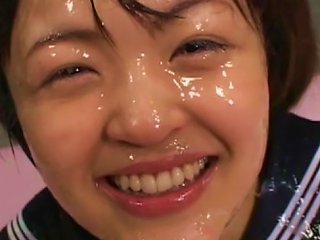 Cute Asian Babe Gets Loads Of Cum Over Her Face